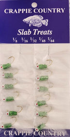 Card of Crappie Country Slab Treats chenille jigs in green, in sizes 1/8 to 1/64 oz